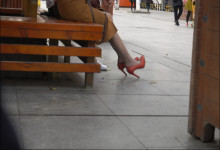 Laughing in the park and dangling legs